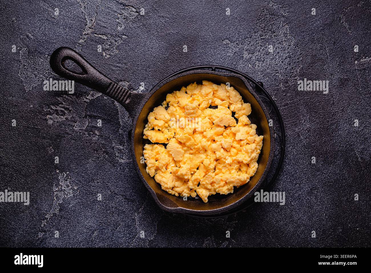 Cooked omelette in a frying pan, top view. Stock Photo