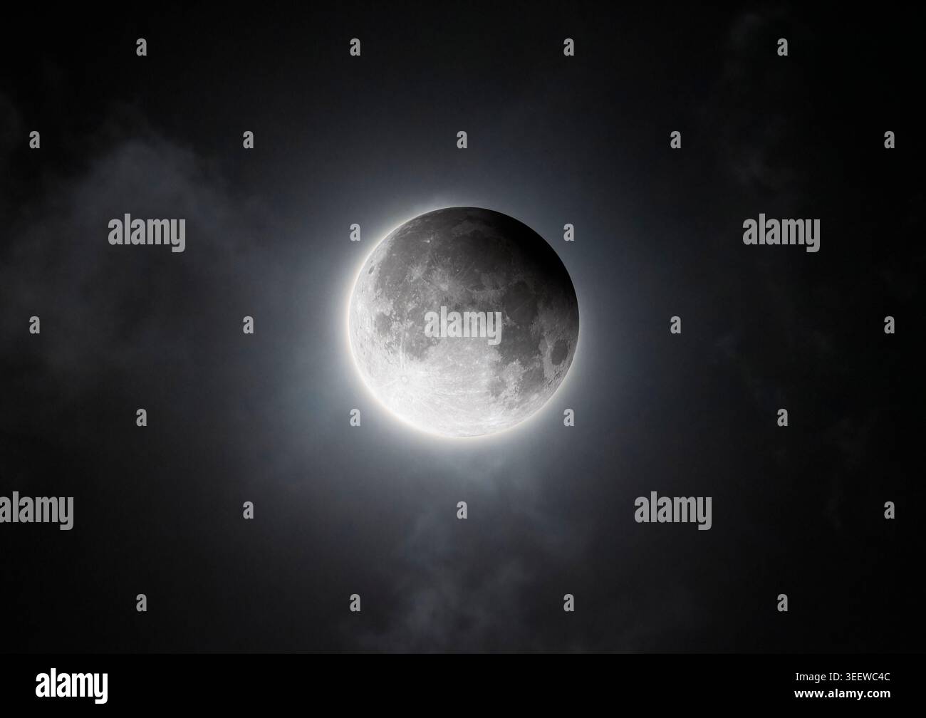 Mysterious Cloudy Sky During Partial Moon Eclipse Stock Photo