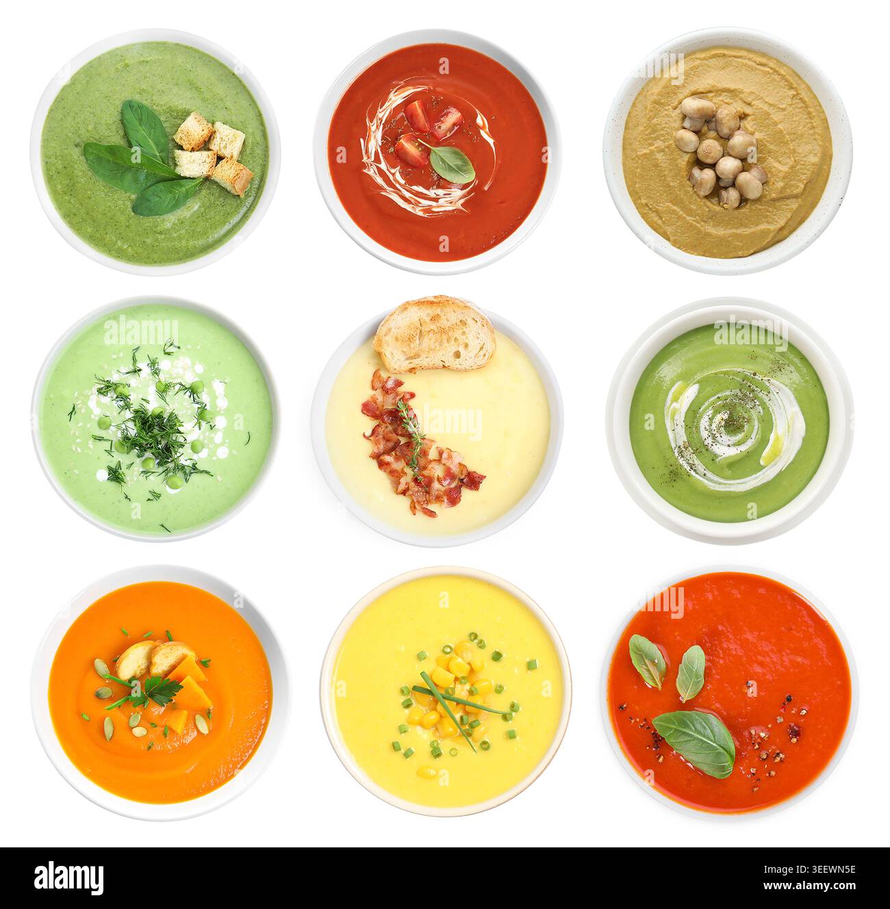 Different tasty soups in bowls isolated on white, collage. Top view Stock Photo