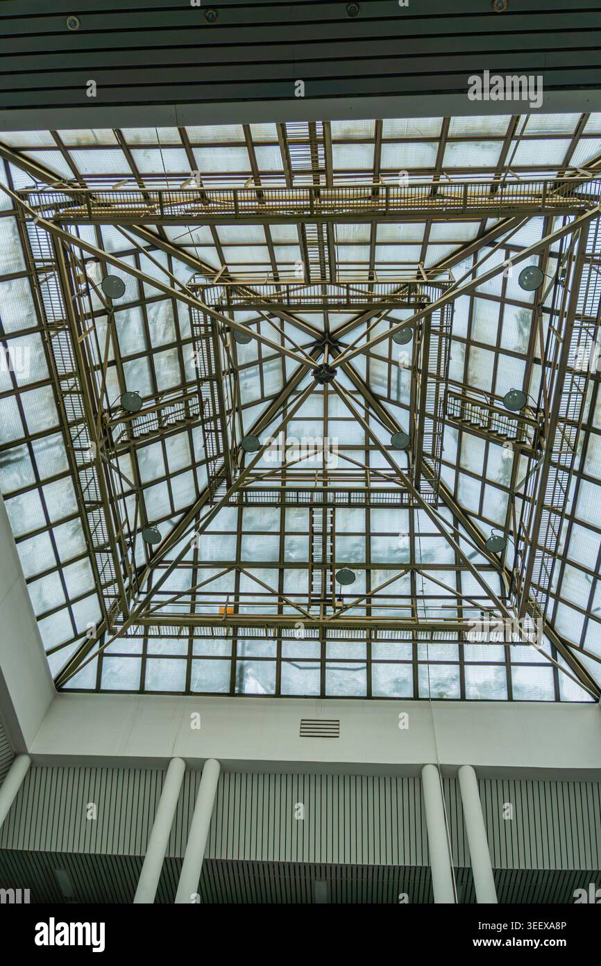 A spacious interior with a central geometric lattice structure ...