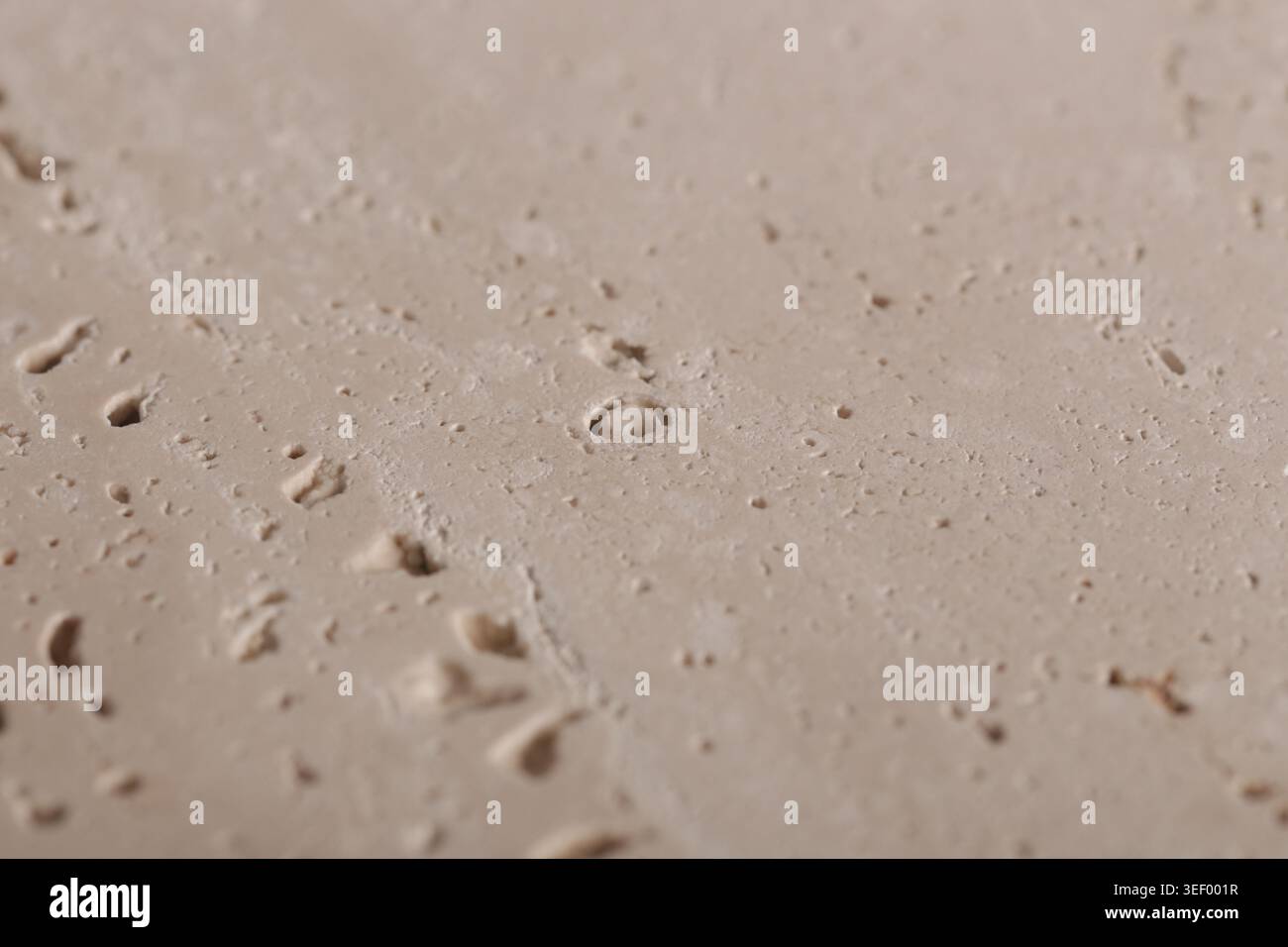 Natural travertine stone background, close up Stock Photo
