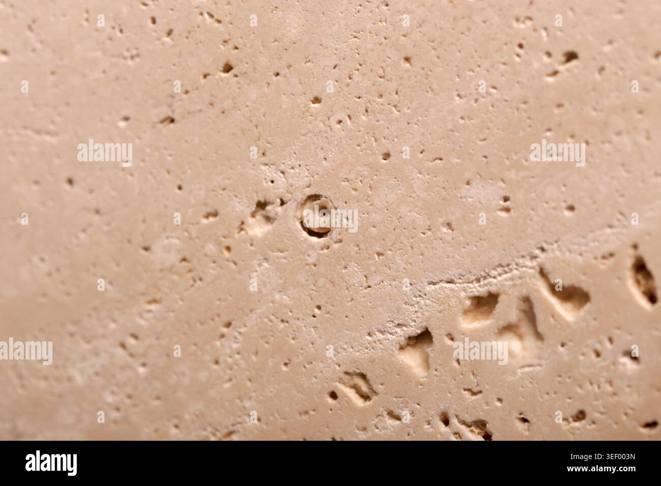 Natural travertine stone background, close up Stock Photo