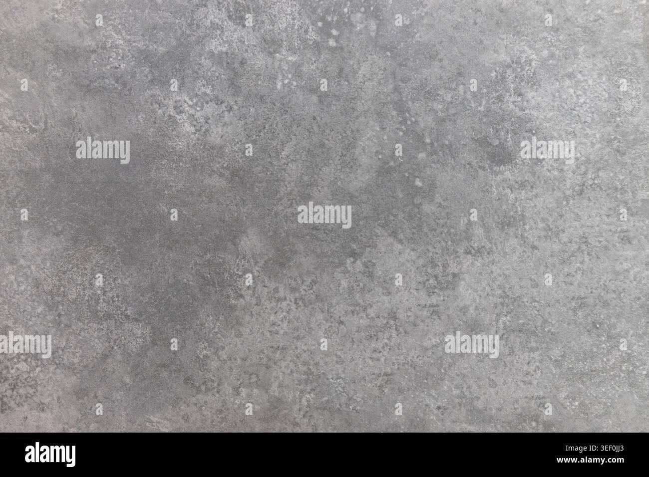 Weathered gray stone tile surface with grunge texture Stock Photo