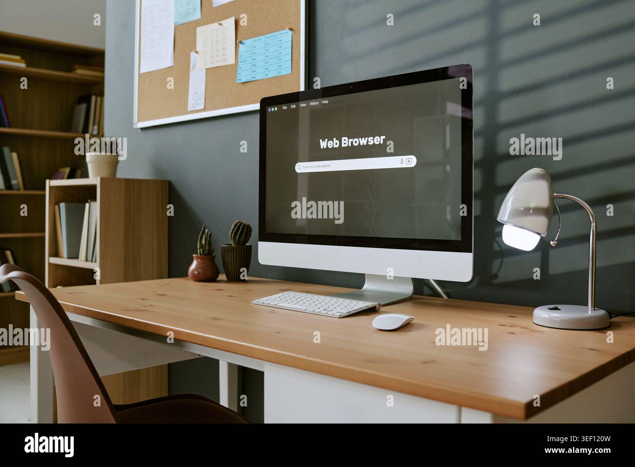 Home Office Workspace Featuring Desktop Computer for Online Learning Stock Photo