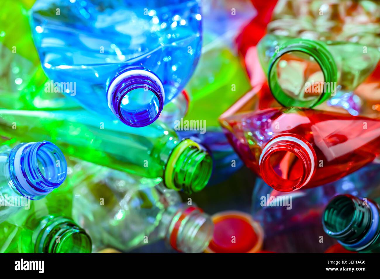 Empty colored drink bottles. Recyclable plastic waste. Stock Photo