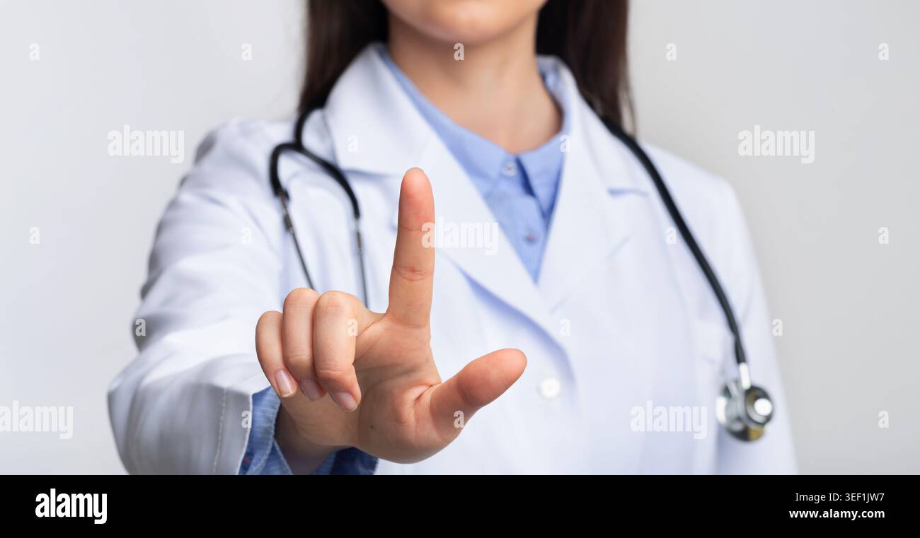 Doctor Using Invisible Medical Touchscreen Pressing Button, Cropped, Panorama Stock Photo