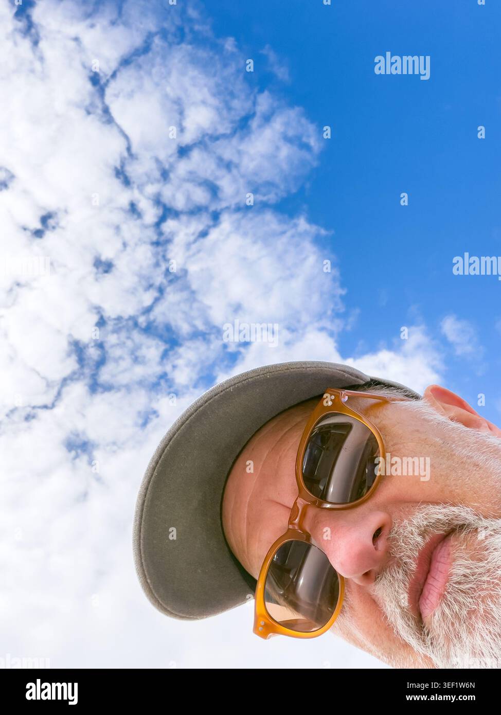 Portrait of a man with beard and cap hi-res stock photography and ...
