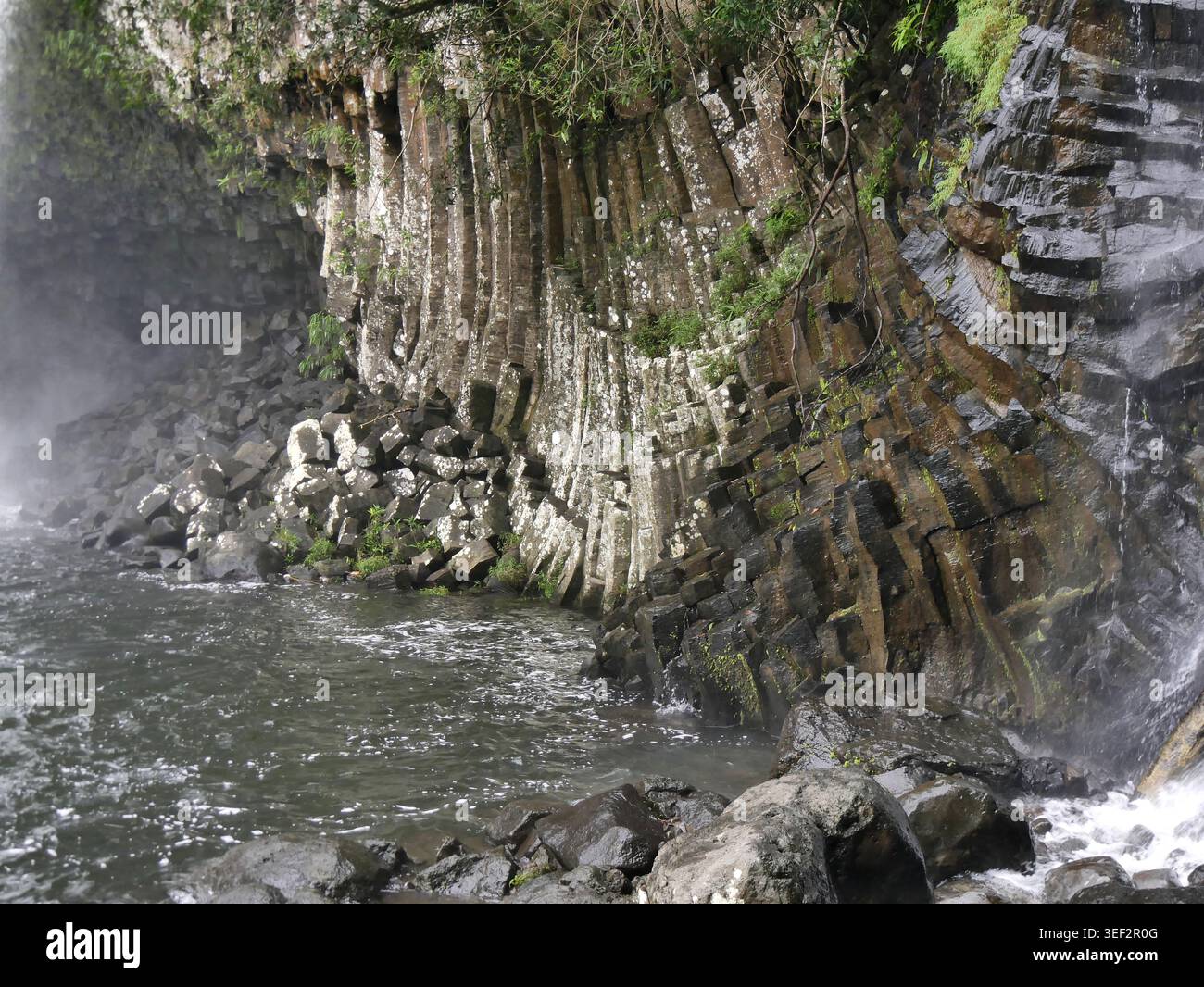 Basalt columnar jointing at Bassin la paix in La Reunion. Geological ...