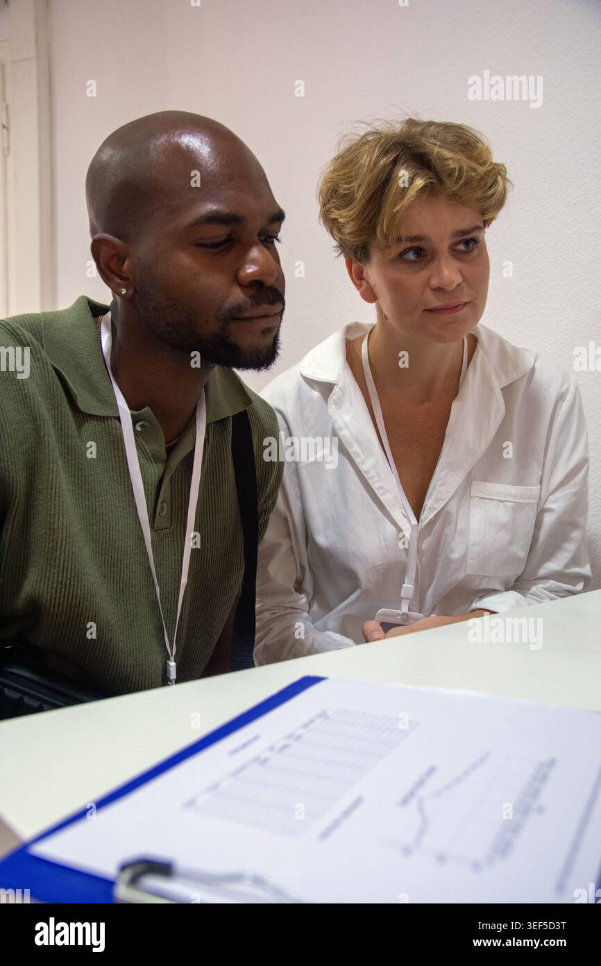 Diverse colleagues collaborating on professional business data analysis Stock Photo