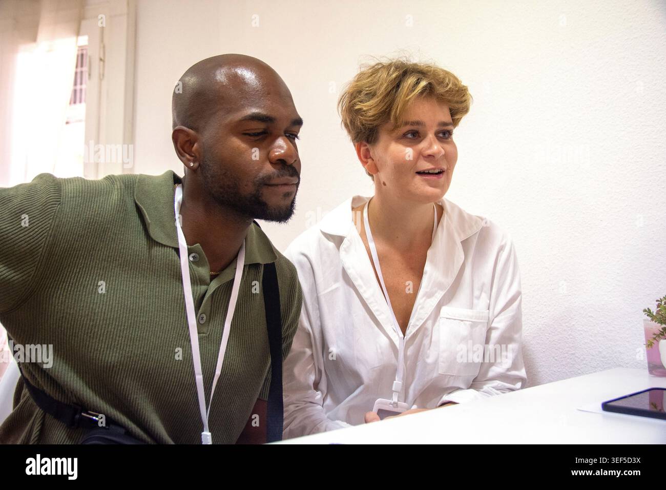 Diverse colleagues collaborating together in the office Stock Photo