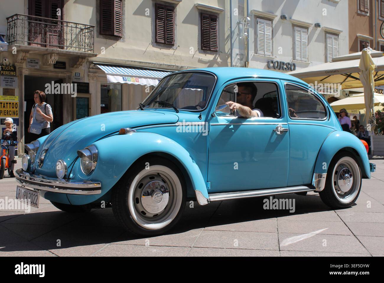 Side view of a sky blue vintage Volkswagen Beetle with whitewall tires at the 30th International Oldtimer Auto Rally in Rijeka, May 2, 2026. Stock Photo