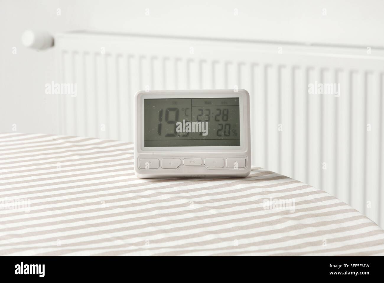 Programmable Thermostat for Home Heating and Cooling Control Stock Photo