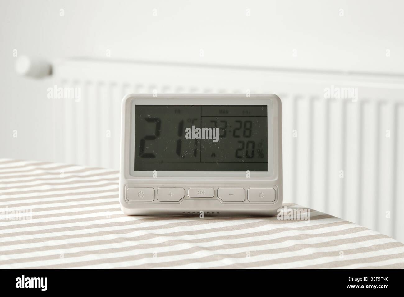 Programmable Thermostat for Home Heating and Cooling Control Stock Photo