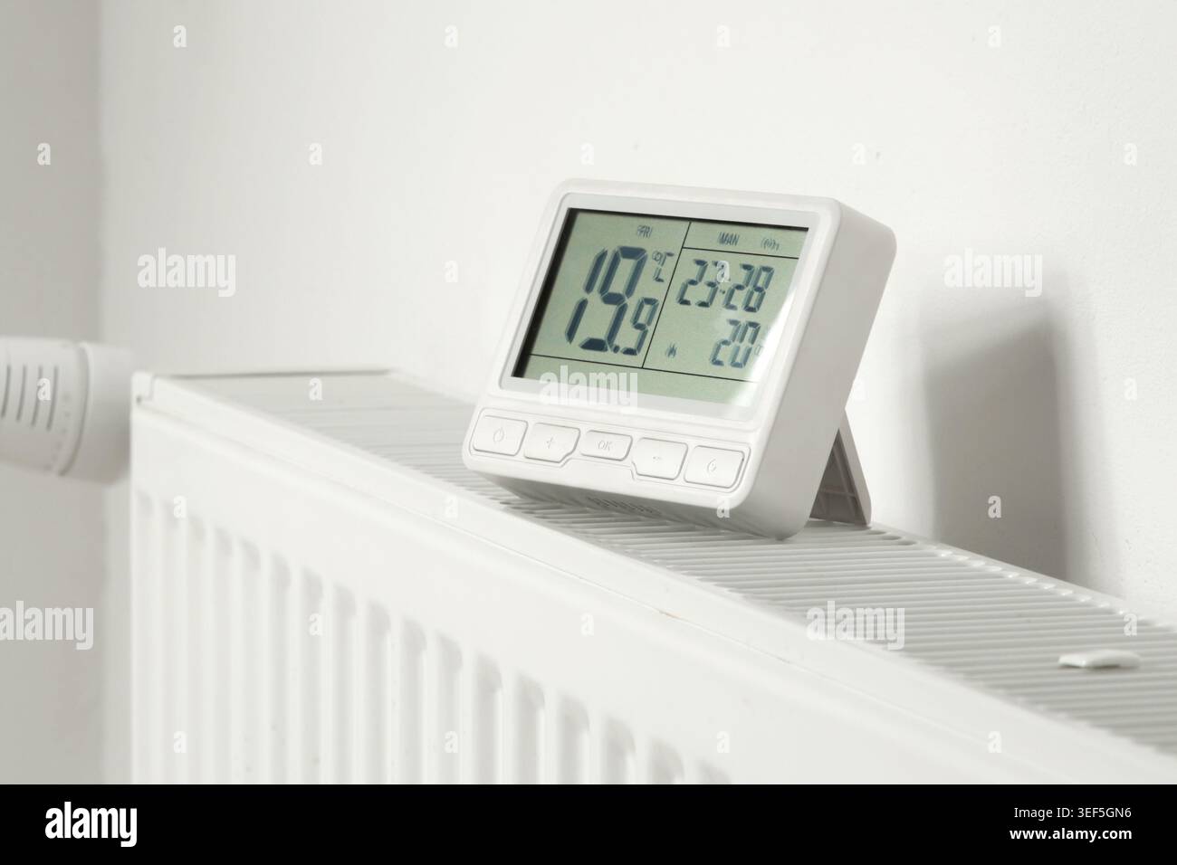 Programmable Thermostat for Home Heating and Cooling Control Stock Photo