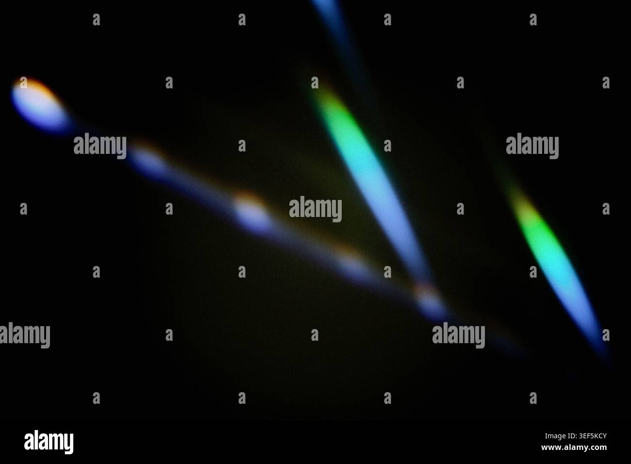 Colorful light creating spectrum effect on dark background Stock Photo