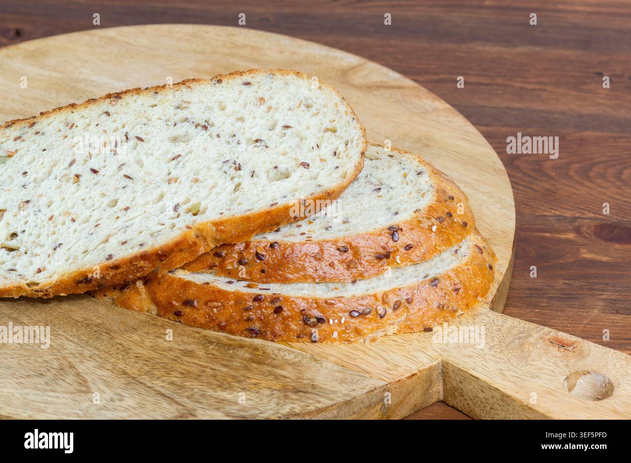 Multigrain bread on a wooden background Stock Photo