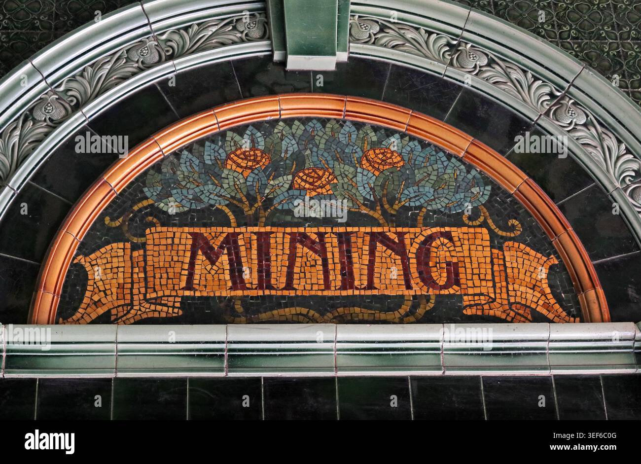 Historic Mining mosaic in the entrance porch of Wigan Town Hall, formerly Wigan Mining and Technical College, Greater Manchester Stock Photo