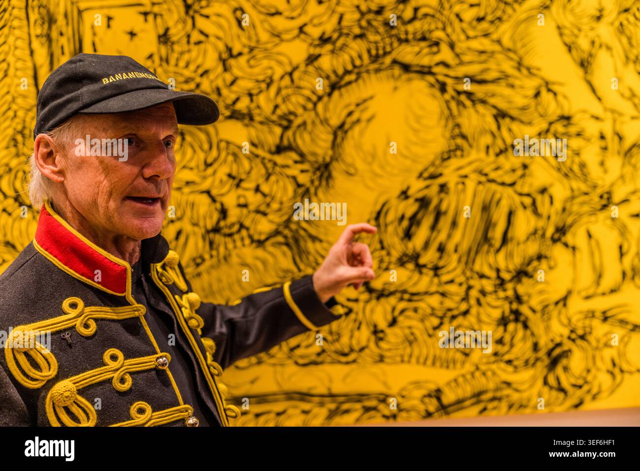 Thomas Baumgärtel at the opening of the exhibition “40 Years of Bananensprayer”. This major project runs from May to the end of September 2026 and is themed “Freedom for Art”. The NiederrheinTour 2026 will showcase 40 groups of works spanning 40 years at 40 art venues. Here in the Grevenbroich dispatch hall with images from the Bananenpointillismus series. Grevenbroich, Nordrhein-Westfalen, Germany Stock Photo