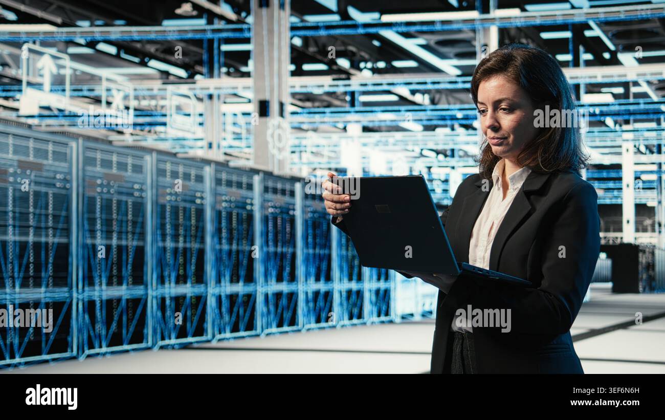 Data center system administrator using AR tech to conduct security audit on IT infrastructure. Server room employee using blue wireframe mesh visualization to verify firewall protection Stock Photo