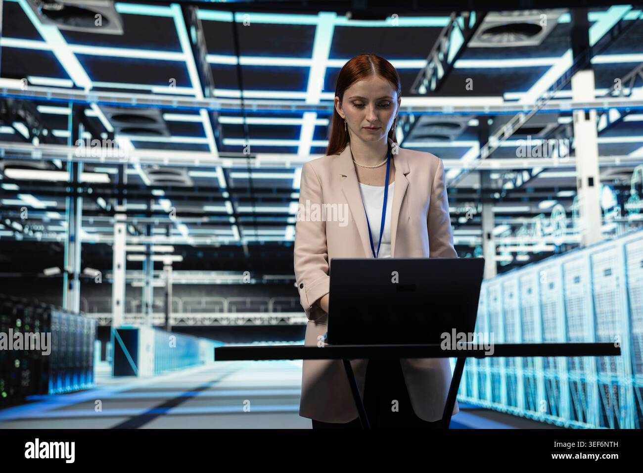 Data center software developer using laptop program to evaluate equipment diagnostic reports. Server hub expert scripting automated workflows using notebook application to oversee mainframes Stock Photo