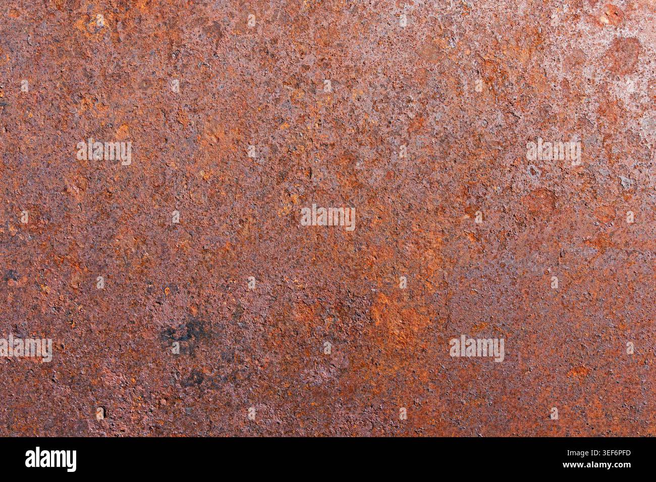 rusty iron metal background with red orange color and pitting and corrosion Stock Photo