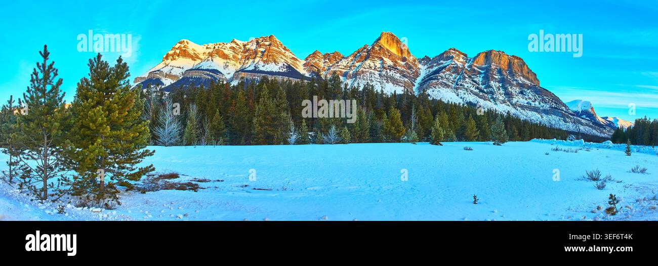 Panorama Snowy Mountain Sunrise Forest and Winter Landscape in Morning Light Stock Photo
