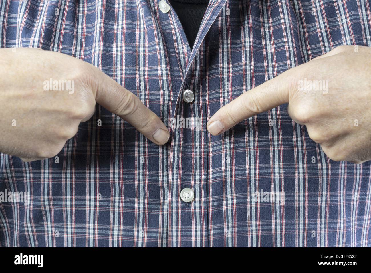 A man pointing at himself with his fingers Stock Photo
