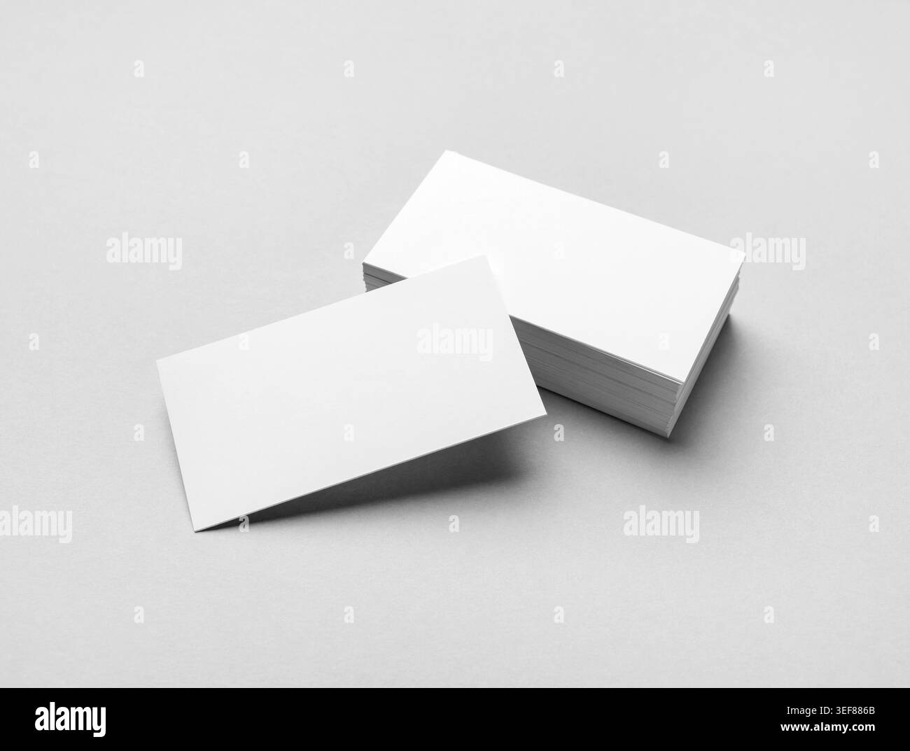 Blank business cards on paper surface. Mockup for branding identity Stock Photo