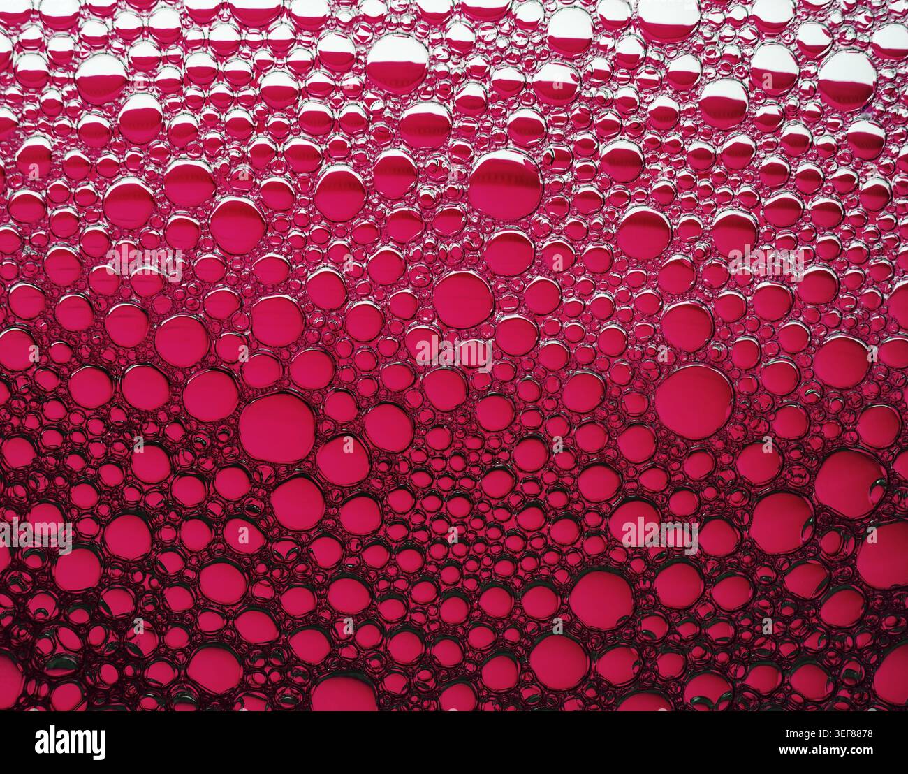 Red bubbles background. Foam bubbles macro texture Stock Photo