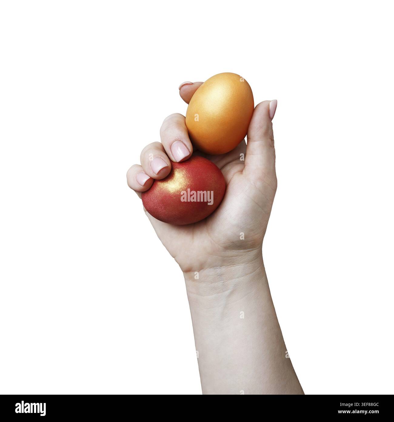Easter eggs in female hand isolated on white background. Clipping path Stock Photo