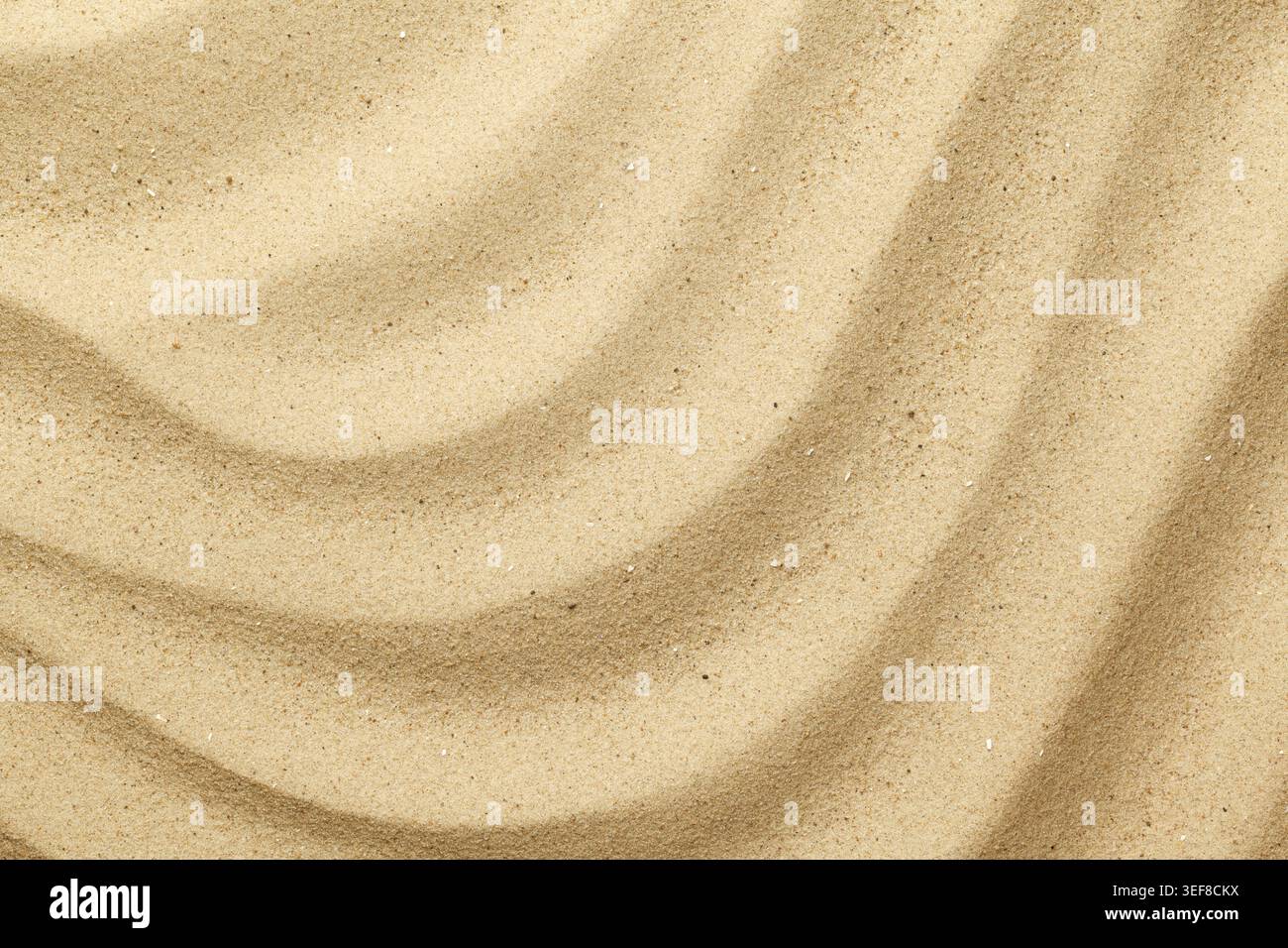 Wavy sea sand background. Flat lay. Top view Stock Photo