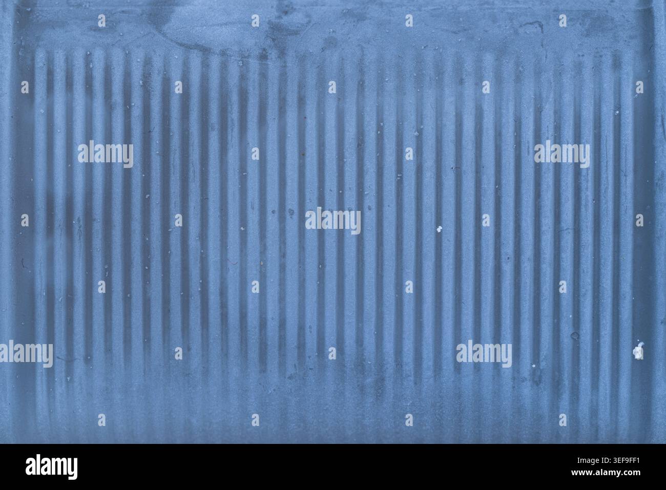 Cold blue frosted glass texture background with frozen vertical lines Stock Photo