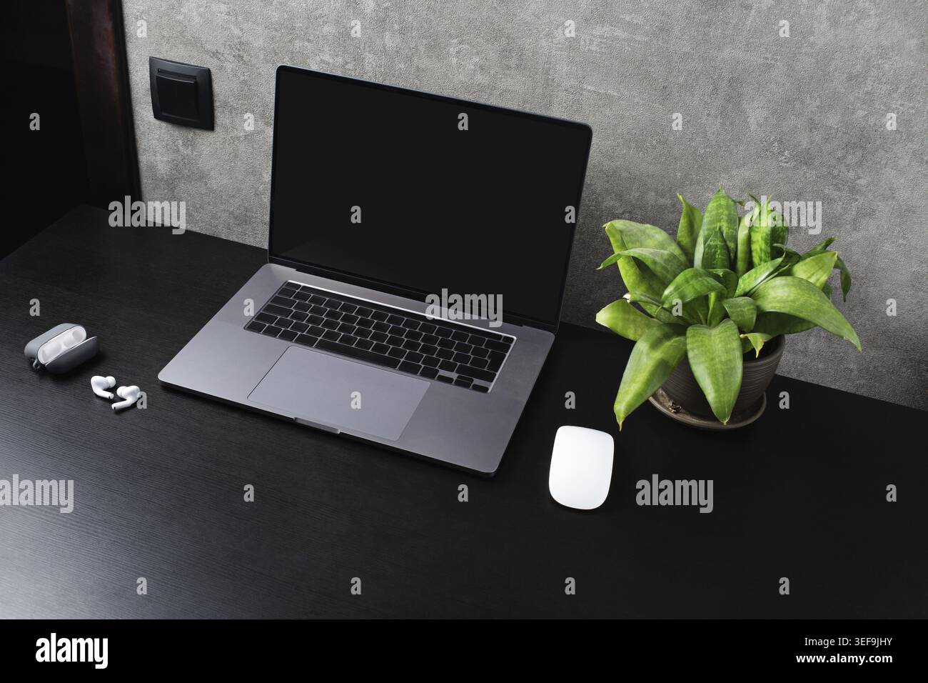 Office gadgets and laptop with blank screen Stock Photo