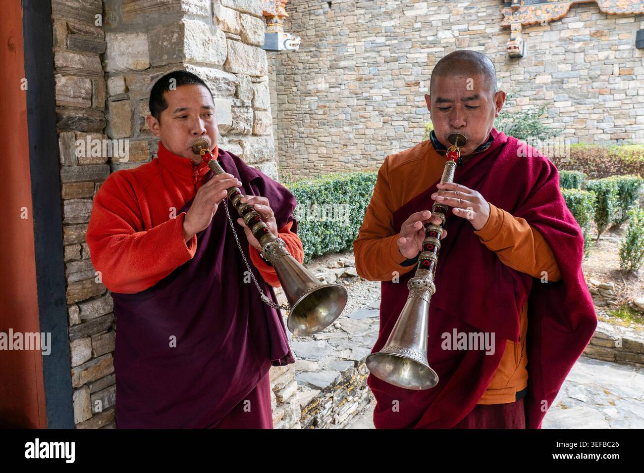 Musicians play traditional instruments in Paro Bhutan during a cultural gathering Stock Photo
