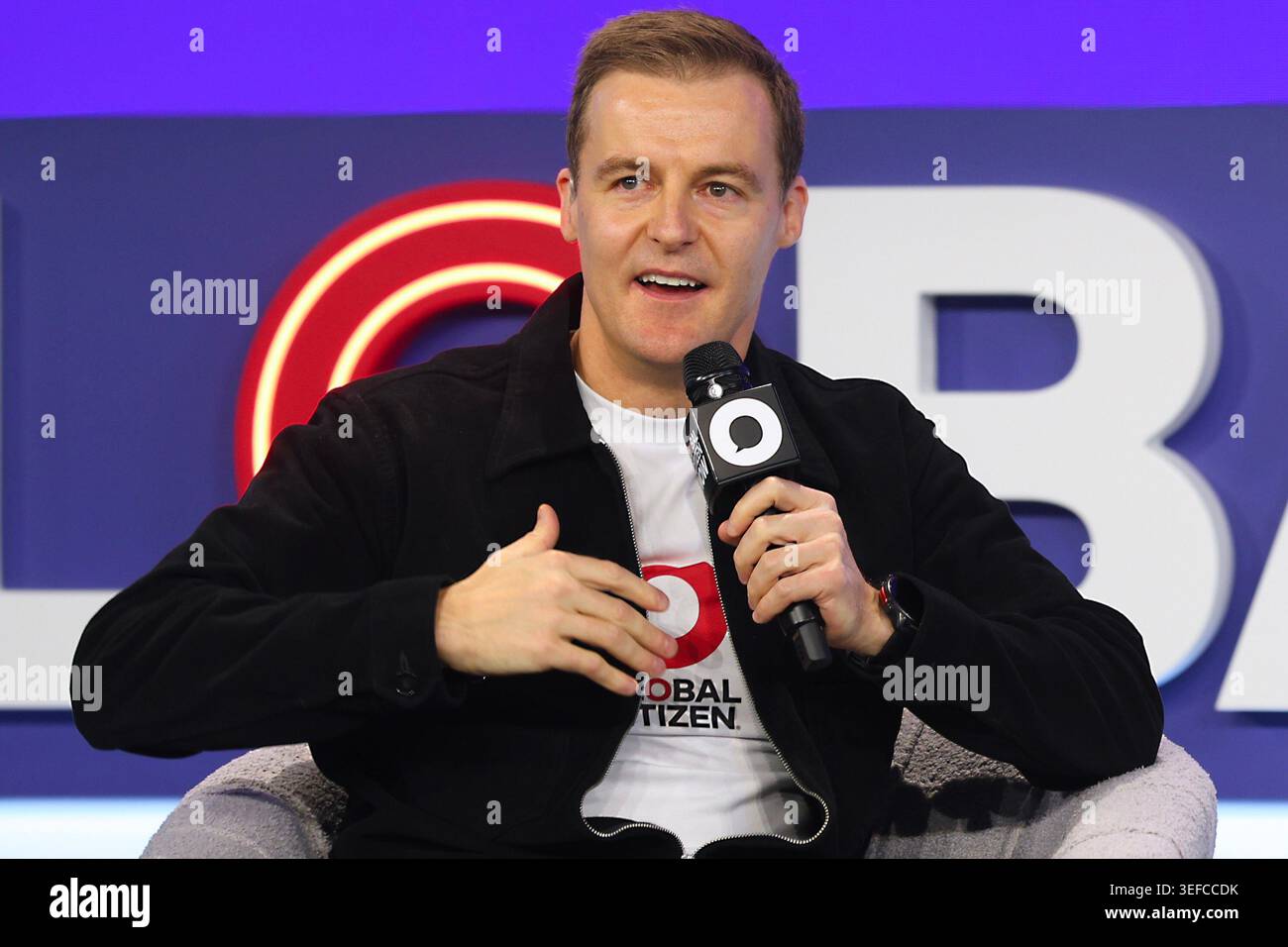 Hugh Evans speaks on a panel during the Global Citizen NOW summit ...