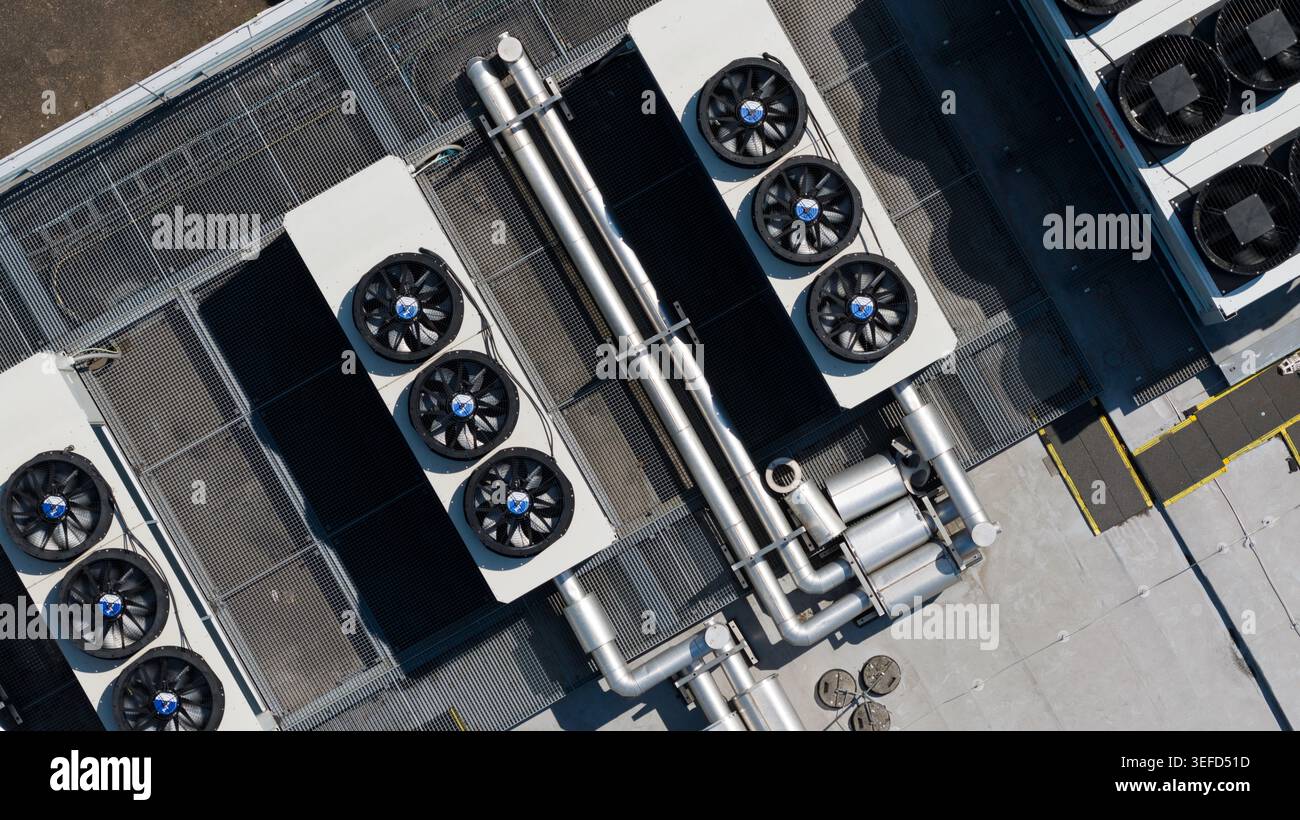 Large scale commercial data center with HVAC, cooling, ventilation, colocation, big data processing, and machine learning infrastructure. Stock Photo