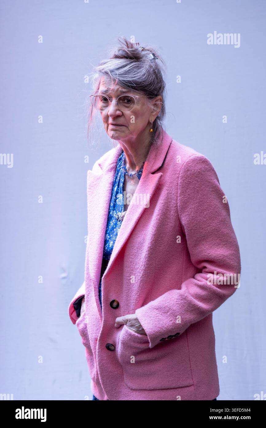 Woman wearing glasses coat hi-res stock photography and images - Alamy