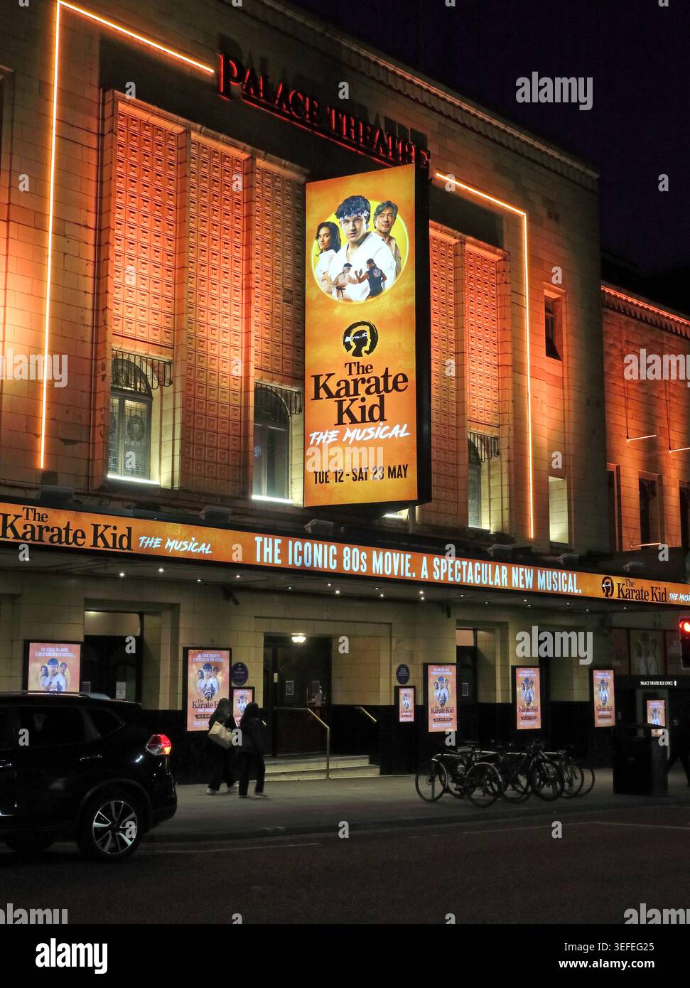 Palace Theatre Manchester at dusk advertising The Karate Kid: The Musical on Oxford Street. Stock Photo