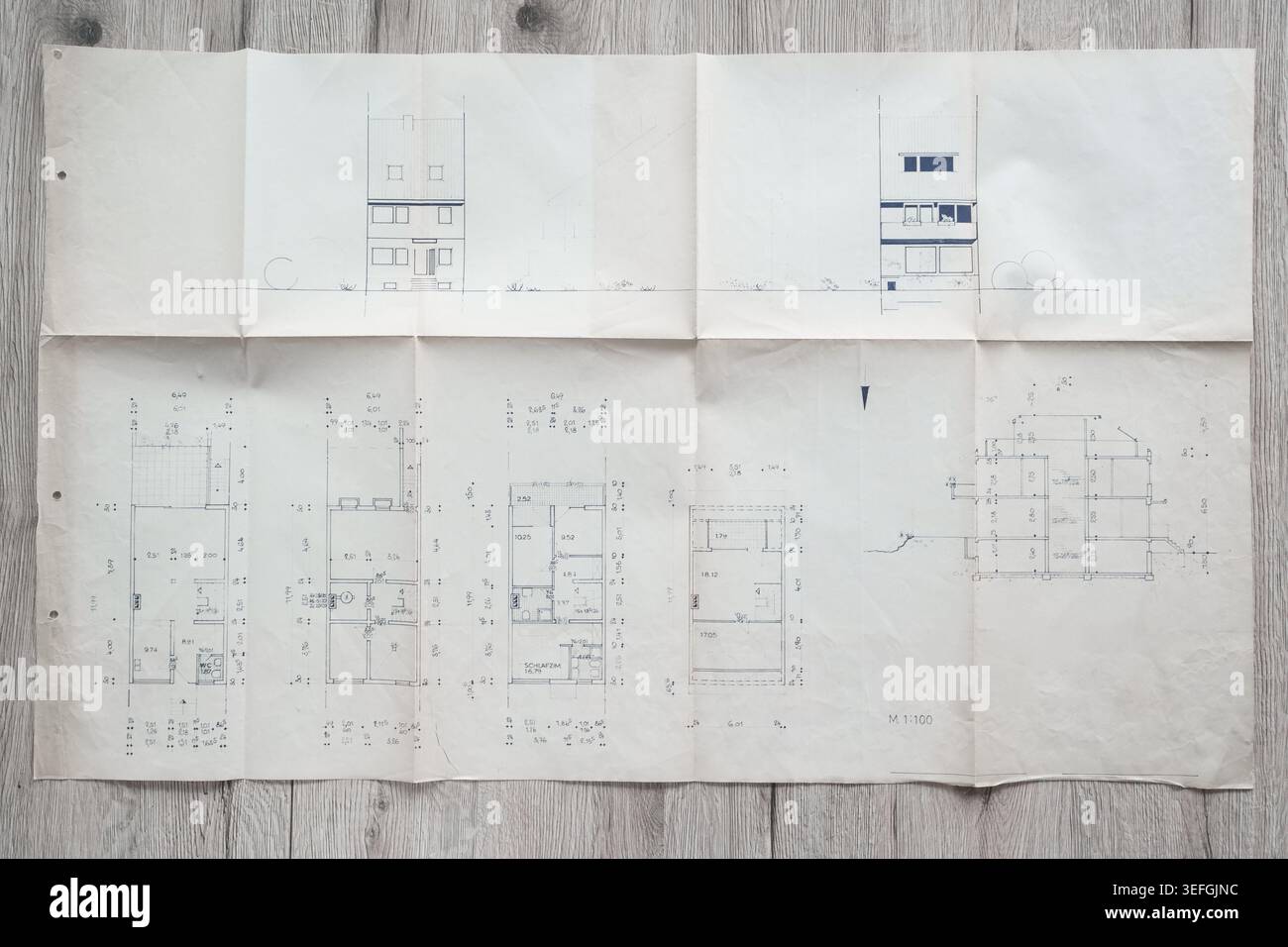 Architect rolls and architectural plan,technical project drawing Stock Photo