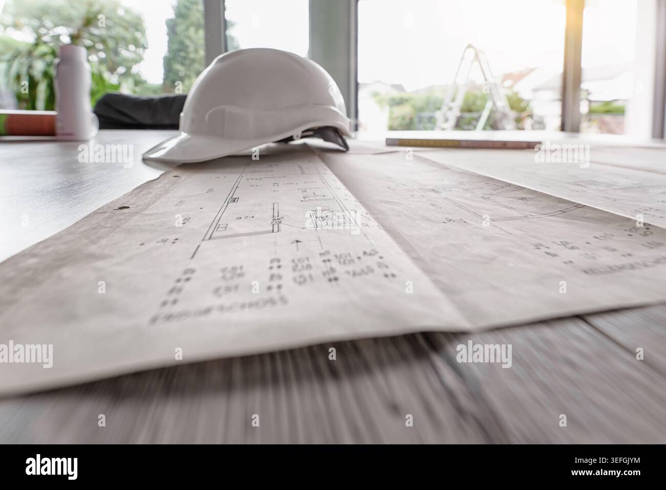 Architect rolls and architectural plan,technical project drawing Stock Photo