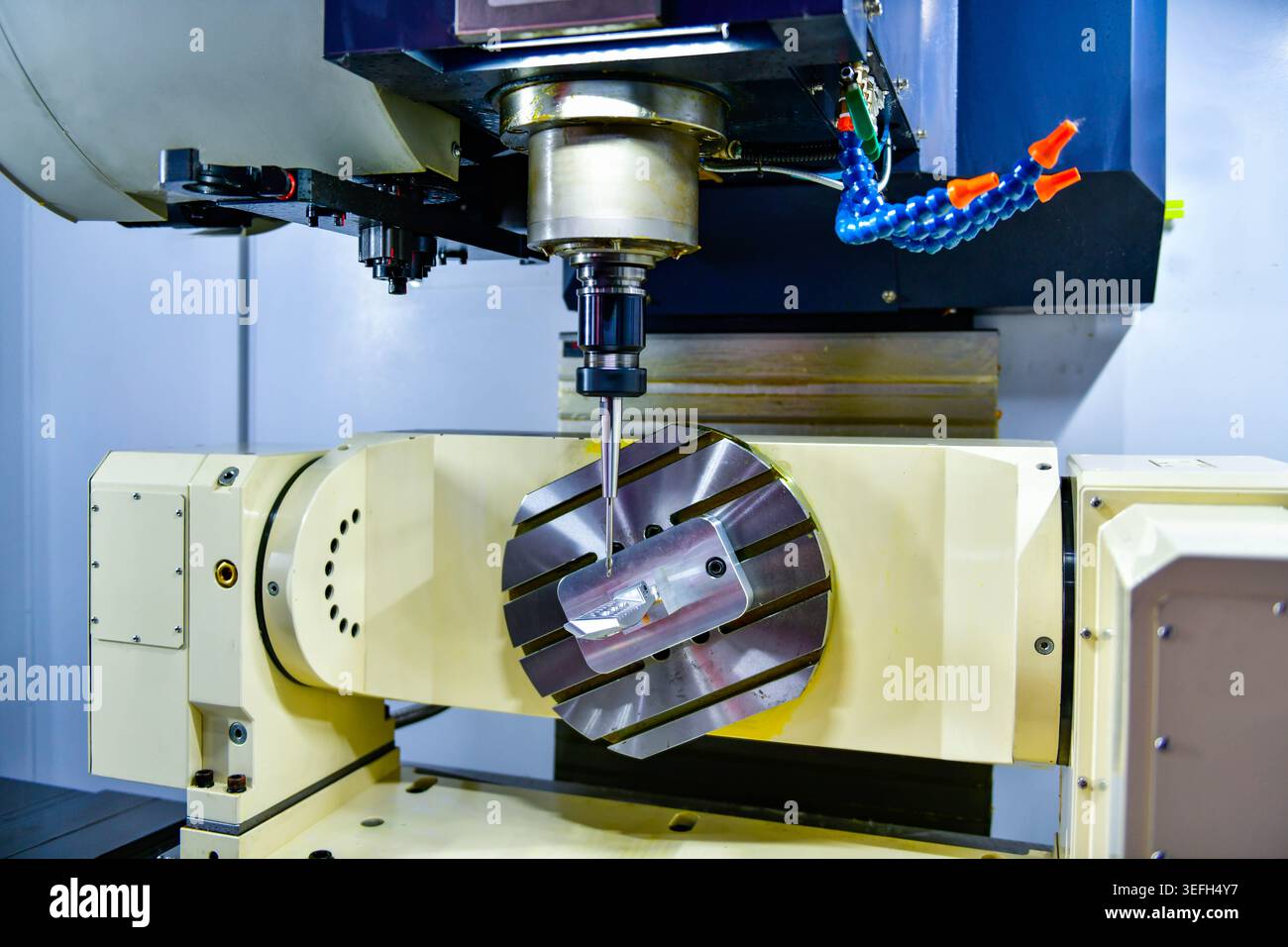 5 Axis CNC milling machine precision manufacturing process, metalworking industry. Stock Photo