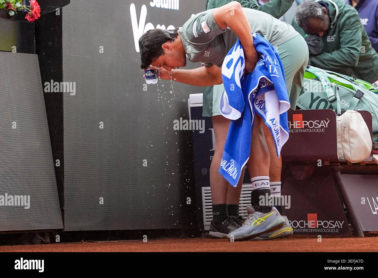 Rome, Italy. 15th May, 2026. Luciano Darderi of Italy splashes water on his face during the match against Casper Ruud of Norway at the Internazionali BNL d'Italia 2026 tennis tournament at Foro Italico in Rome (Italy) on May, 15, 2026. Credit: Insidefoto/Alamy Live News Stock Photo