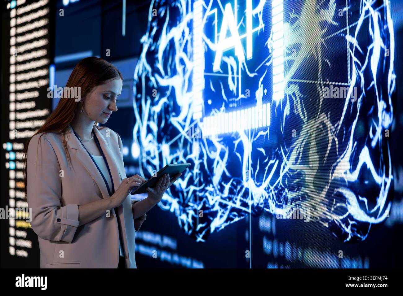 Engineer uses tablet to approve automated AI agent modifications. Software developer offloading code generation to AGI artificial intelligence, streamlining programming tasks Stock Photo