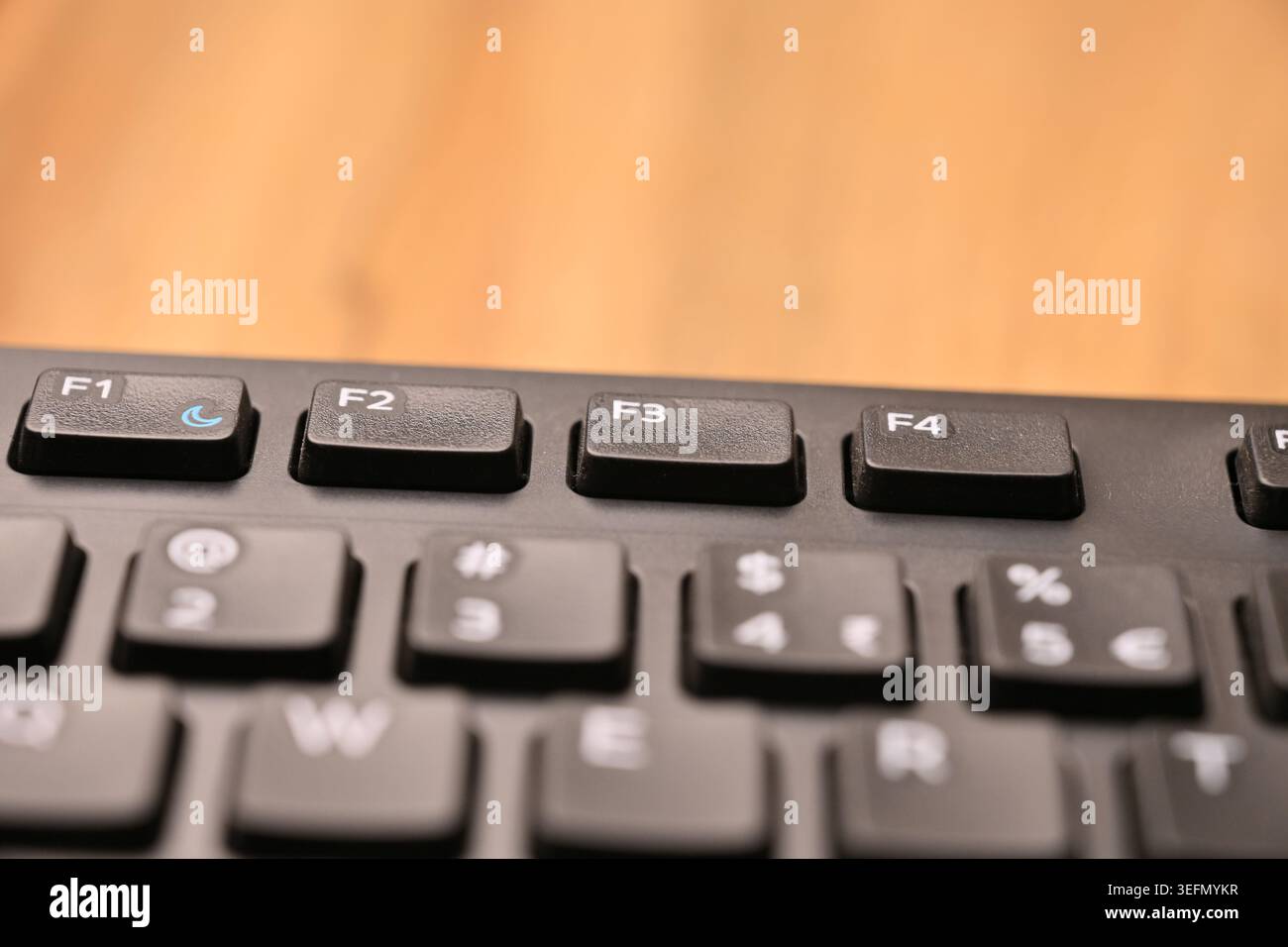 Minimal Black Keyboard Macro Compositions Highlighting F3 Function Key in Soft Focus Angled Top View Stock Photo