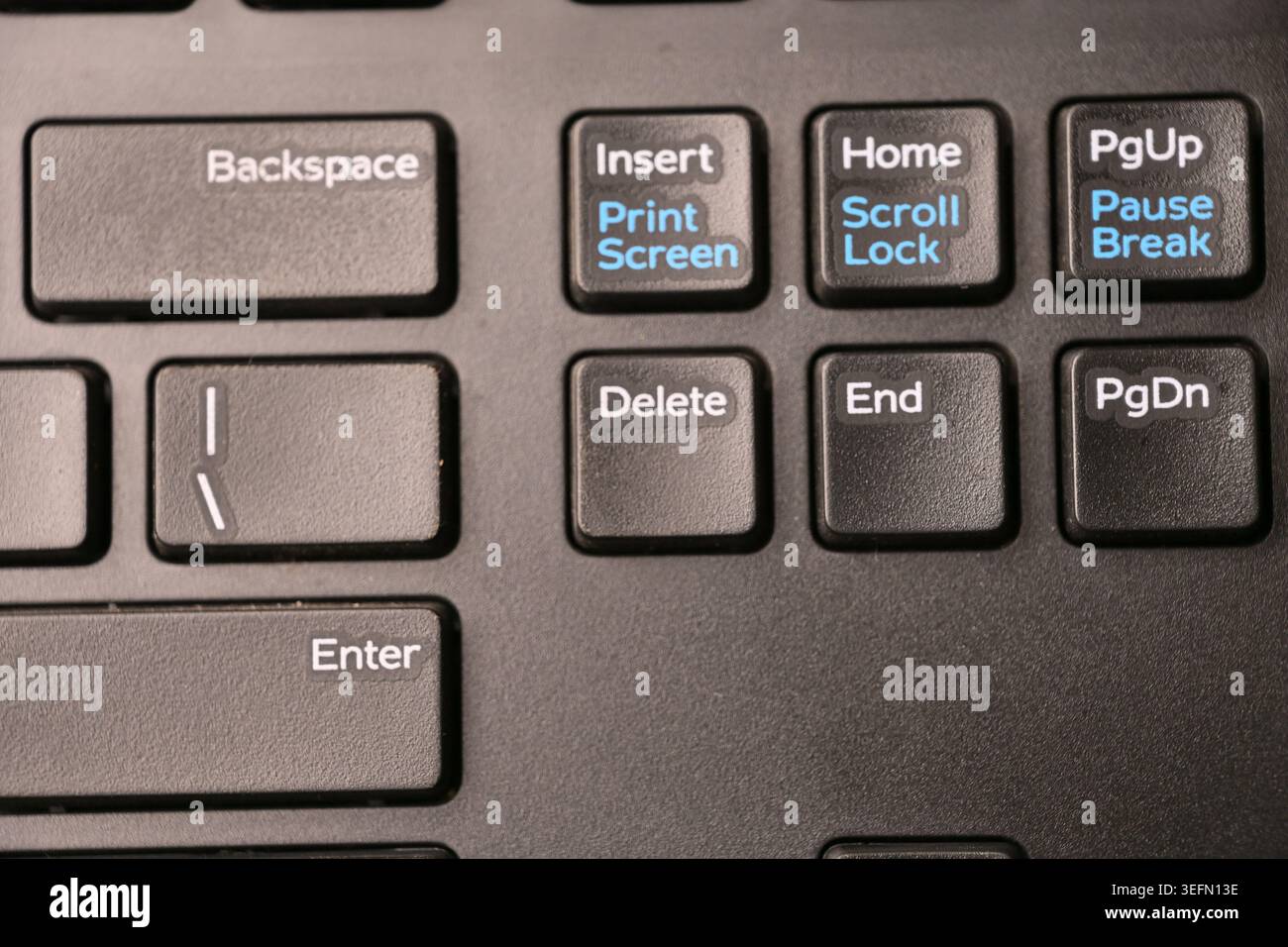 Black Computer Keyboard Top View Macro Shot with Delete Key Focus and Blurred Backgrounds Stock Photo