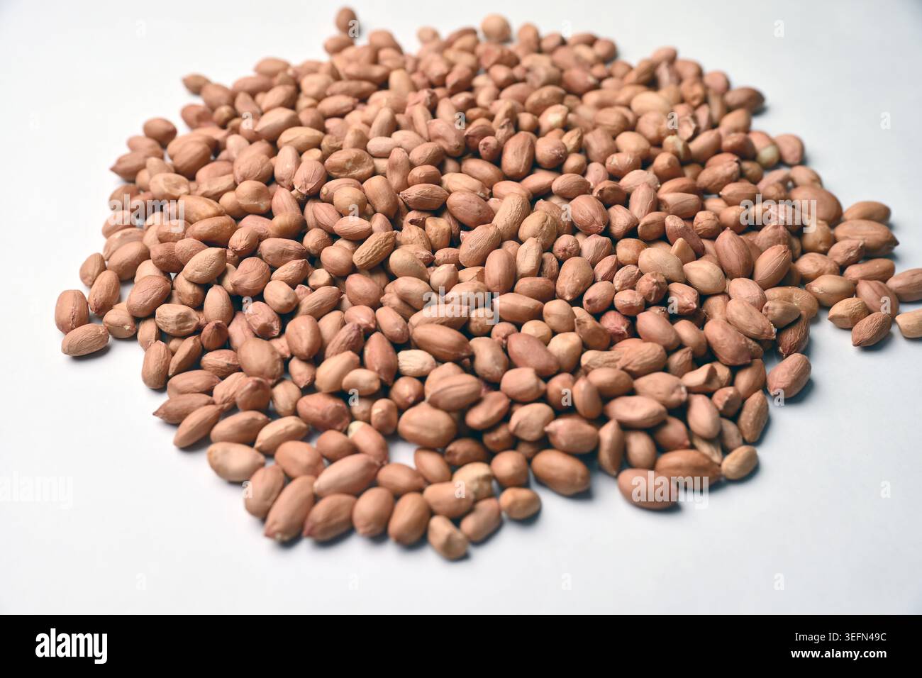 peanuts on white background Angled Top View Stock Photo