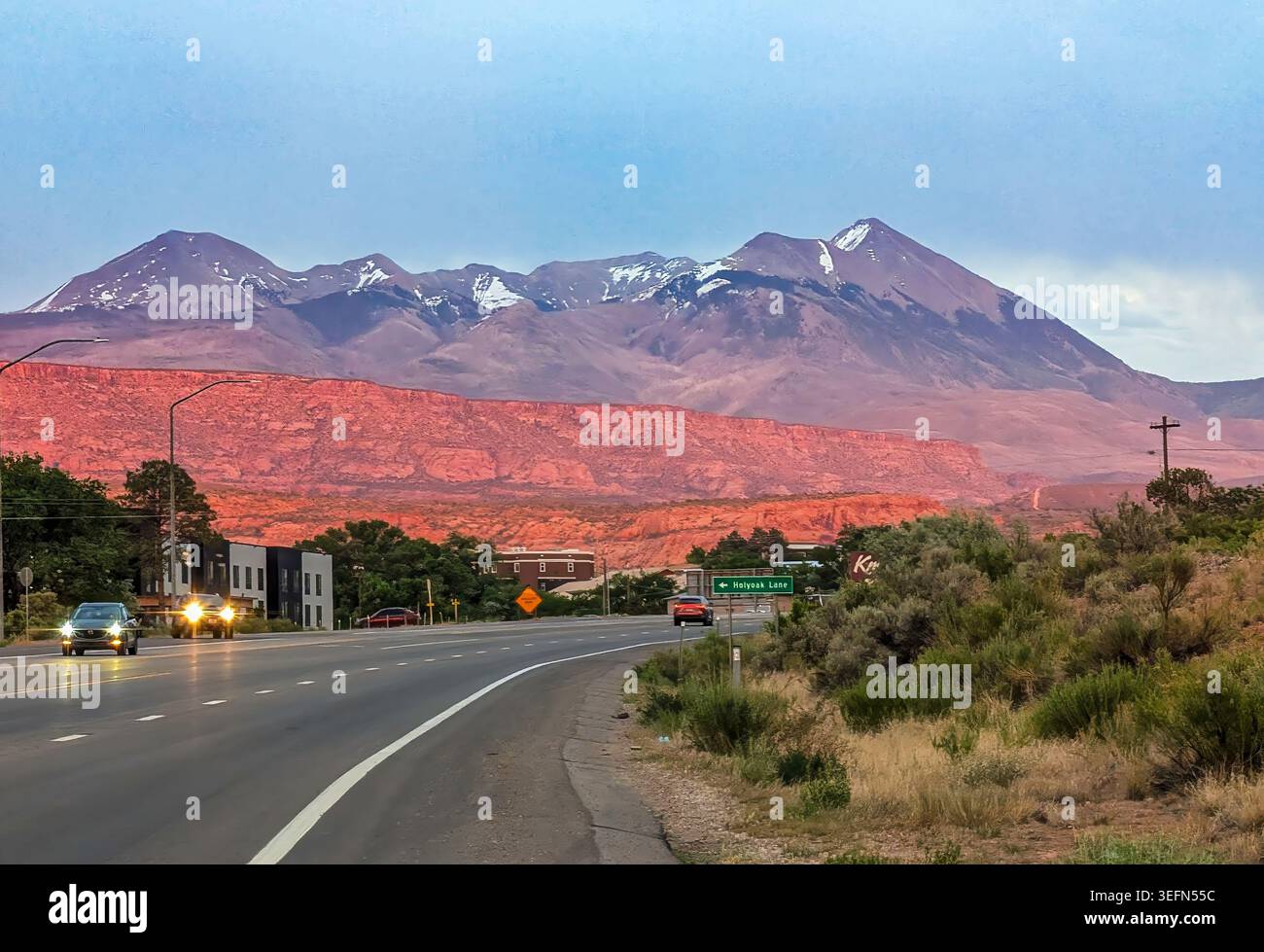 Moab, Utah - May 15, 2026: Sunset brings out the red in the red rocks in the area between Moab and the La Sal Mountains - Smartphone Captured Stock Image