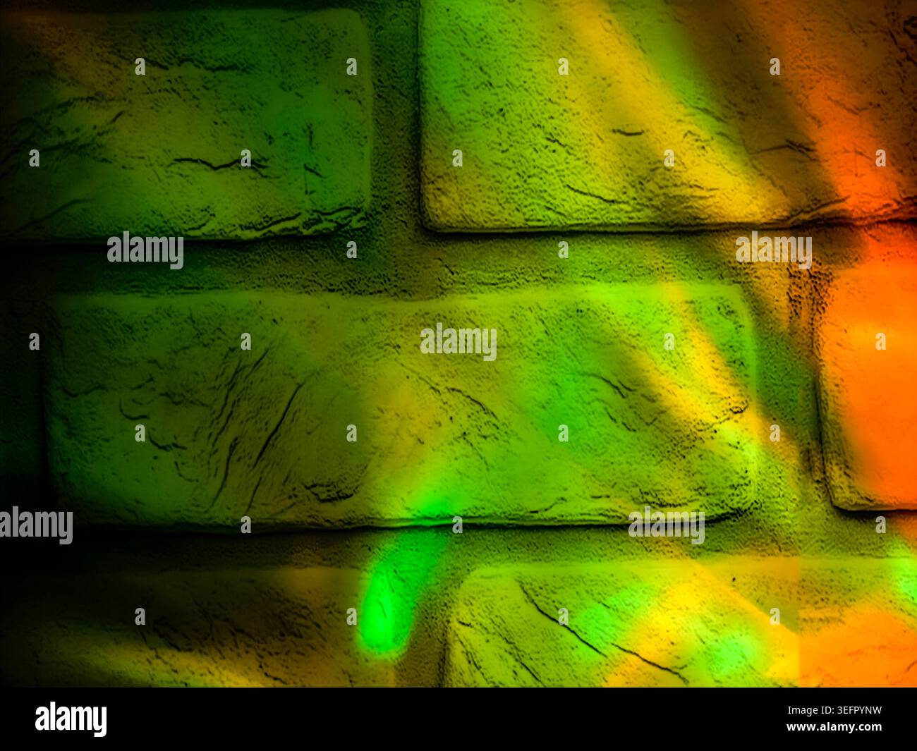 Green and orange glowing reflections illuminating a textured brick wall surface. Abstract decorative background Stock Photo