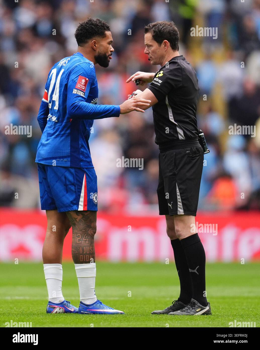 Chelsea's Reece James remonstrates with referee Darren England (right ...
