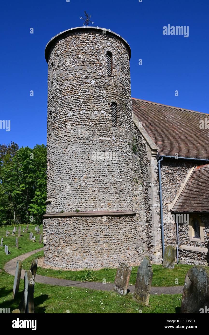 The Saxon round tower of St Mary's Church, Burnham Deepdale, Norfolk, England, UK Stock Photo